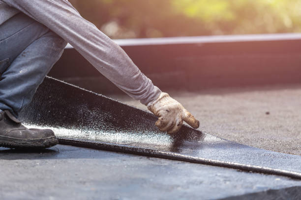 Professional Basement Waterproofing technician working in Montgomery, OH